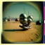 Placeholder: Odd spindle-shaped objects scattered over an arid surface, nothingness, close-up, polaroid, in Yves Tanguy style, nightmare