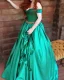 Placeholder: Magic princess with long auburn hair green eyes wearing a big teal green and gold satin ballgown corset off shoulder top casting magic