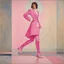 Placeholder: [Kupka] Jesus Christi in a pink battlesuit pink gloves and pink high heel boots. The Ministry of Silly Walks.