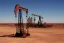 Placeholder: oil rig in the desert