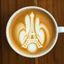 Placeholder: close up top-down view of a latte with a white Eiffel tower formed in the milky foam, professional photography, looks like an advertising campaign photo, delicious