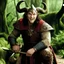 Placeholder: [photo from Pan's Labyrinth (2006)] Conan was quick to laugh quick and terrible in his wrath. He was a valiant trencherman, and strong drink was a passion and a weakness with him. His fine ring-mail which sheathed his arms and leg; the blade at his girdle was a great broadsword; and his scarlet cloak could have been spun nowhere but in Ophir.