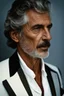 Placeholder: Portrait of a handsome older italian gentleman wearing crisp white linen suit, and an open necked shirt. His dark hair is peppered with grey, his neatly trimmed beard is dark and peppered with grey