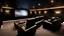 Placeholder: black themed home cinema room, recliners, ambient lighting, warm environment