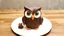 Placeholder: An owl made of cake.