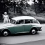 Placeholder: WOMAN driving volvo AMAZON ESTATE by rubens