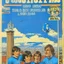 Placeholder: A 1980 medieval london comic cover of uruguayan sky-blue football magazine. At the street city, Monty Pyton. Estadion Centenario Montevideo.