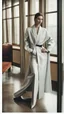 Placeholder: a woman standing in a room next to a table, vman magazine, wearing dramatic aristocrat robe, long - tailed tuxedo coat, deep stillness and silence, body harness, hotel room, elegant girl in urban outfit, slender girl, glass walls, magazine article