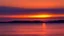 Placeholder: sunset over the light rippling waters of the bay