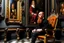 Placeholder: man with red beard sitting in a gothic armchair, golden armrests with trim, In the background a painting by Caravaggio covers the wall