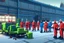 Placeholder: Santa Claus is visiting a factory and give them presents, cartoon style Simon Stålenhag