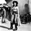 Placeholder: Rosanna schiaffino as a woman pistolero in the western "the man called noon", she stands in her santiag boots