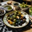 Placeholder: A plate of olives surrounded by breakfast