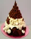 Placeholder: Matterhorn model made of chocolate cake and biscuits and maltesers