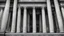 Placeholder: a high-quality image of imposing (pillars of law) standing tall in front of a grand courthouse, majestic, symbolizing strength and justice, black and white, architectural photography, monochrome, dramatic lighting, vertical composition, historical significance, detailed craftsmanship, timeless, courthouse architecture, legal system, authoritative, legal symbol, iconic.