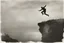 Placeholder: man jumping from the cliff by phil hale