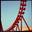Placeholder: kodachrome of a roller coaster, evening light, ralaxing, vintage