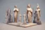 Placeholder: low poly model of people worshipping statues and idols