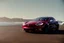 Placeholder: A Tesla 'Model S' is going at a high speed, at the 'Santa Monica State Beach' in California. (CINEMATIC, WIDE ANGLE LENS, PHOTO REAL)