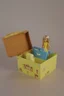 Placeholder: empty yellow and blue barbie doll box