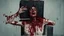 Placeholder: a gross woman covered in blood holding up a black rectangular box