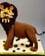 Placeholder: Lion king model made of cake with chocolate buttons