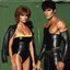 Placeholder: An extremely muscular young man who resembles an old, decomposing zombie with pixie-cut black hair, wearing a black leather jacket and pants, standing next to a beautiful woman with auburn hair who resembles Raquel Welch, wearing a black two-piece bathing suit with a perfect shaped, stacked body, and a perfect face, 4k, 8k, 32k UHD, Hyper realistic, extremely colorful, vibrant, photorealistic, realistic, sharp, highly detailed, professional quality, beautiful, awesome, majestic,