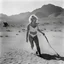 Placeholder: Fritz Lang, expensive horror movie scene, Marilyn Monroe in_undies, attacked by a cowboy with a whip, in the desert