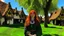 Placeholder: A red-haired, witchy woman standing in the centre of a village green, surrounded by thatched cottages, standing under a large tree. Bright, sunny day.