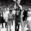 Placeholder: Jalen Brunsen winning the NBA finals at Madison Square Garden and holding the MVP trophy above his head