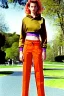 Placeholder: year 1994 women fashion. "summer combat suit trouser" with low waist, baggy, Combat pants, t-shirt and interesting hoodie with high tippet integrated to bolero. Colors: denim blue, blue, purple, khaki, "pastel light green", lilac, plum, orange, terracotta, red, pink, dark blue, beige. Women models. Starling pattern prints.Jennifer Lopez, Gwyneth Paltrow, . Big tennis shoes on. Cargo pants.