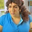 Placeholder: Create a highly realistic 3D scene. An detailed Realistic of Play Football Diego Maradona transforming her into a woman with the same specifications as the attached image. The method of transforming the painting in full detail. A comedic and funny touch. Ultra wide angle. Extremely realistic fine details. Highly realistic detailed display. Great full presentation and amazing drawing style. Transfer the full detailed drawing of the image at a wide and precise angle. Inspiri