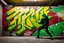 Placeholder: painted on concrete wall of underpass a young cyberpunk hacker paints a complicated colorful / uppercase all-white graffiti text in text: "WINTERMUTE"; street art, graffiti green-yellow-black triotone, wall painted matte black and yellow and deep red, semi-front view, low angle, daylight, cinematic, dramatic