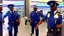 Placeholder: 2 security officers force angry plainly dressed male to leave airport lounge