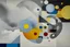 Placeholder: A light gray sky with geometric clouds painted by Wassily Kandinsky