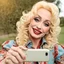 Placeholder: Young Dolly Parton takes a selfie