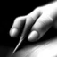 Placeholder: A hand using a pencil, drawing, sofisticated photo