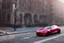 Placeholder: A Tesla 'Model S' is drifting at top speed, in Greenwich Village, in Manhattan. CINEMATIC. WIDE ANGLE LENS. PHOTO REAL.