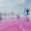 Placeholder: A photo of a landscape. The surface below the structure is glossy. There are fake structures. In the background, other white and blue forms and structures are visible. The atmosphere is metaphysical. The image has a glossy finish. The exposure value is 8.