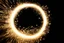 Placeholder: dark background. spinning circle of sparks (bottom and right)