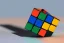 Placeholder: A single, tall Rubik cube vehicle, Orange, white, blue, green