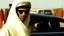 Placeholder: takistan life, movie scene. dr arab cover 1970, closeup dnd style. sunglasses, cape. lawrence of arabia. car race drag.