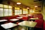 Placeholder: American dinner place interior without of people. early morning in Texas very sunny day. Colorful and juicy style. Like interior design example. All tables is empty but exept one, on that one is all the mess - dirty dishes and garbages. Minimalistic Film photography style. Kodak portra medium format. Wide angle lens photo.