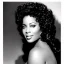 Placeholder: Create a black and white poster movie star celebrity Angela Summers by Herb Ritts photographer.The artwork should have a strong, elegant composition and capture the personality and emotion of Alyssa Cole. Use clean, simple lines and a sense of naturalness and simplicity.The artwork should be in soft colors, with strong contrasts and a high-key or low-key lighting effect.The composition should be balanced and symmetrical, with the subject positioned in the center or slightly off-center.