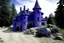 Placeholder: A dark purple castle covered in dust designed in Ica stones painted by Edouard Manet