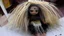 Placeholder: ritual doll made of hair from the floor of a barbershop