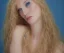 Placeholder: portrait of a beautiful naked blond woman with long hair and blue eyes