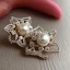 Placeholder: drop diamond and pearl earrings, art noveau, filigree, floral, breathtaking, highly ornate, delicate, intricate, photorealistic, high fashion, fine jewellery, luxury, designer