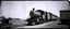 Placeholder: old western railroad, grayscale, antique pinhole photo
