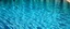 Placeholder: the rippled surface of the water in a pool, just the water
